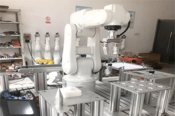 Industrial robotic arm in factory setting