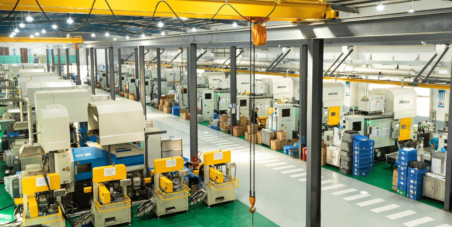 Busy industrial manufacturing factory with machinery