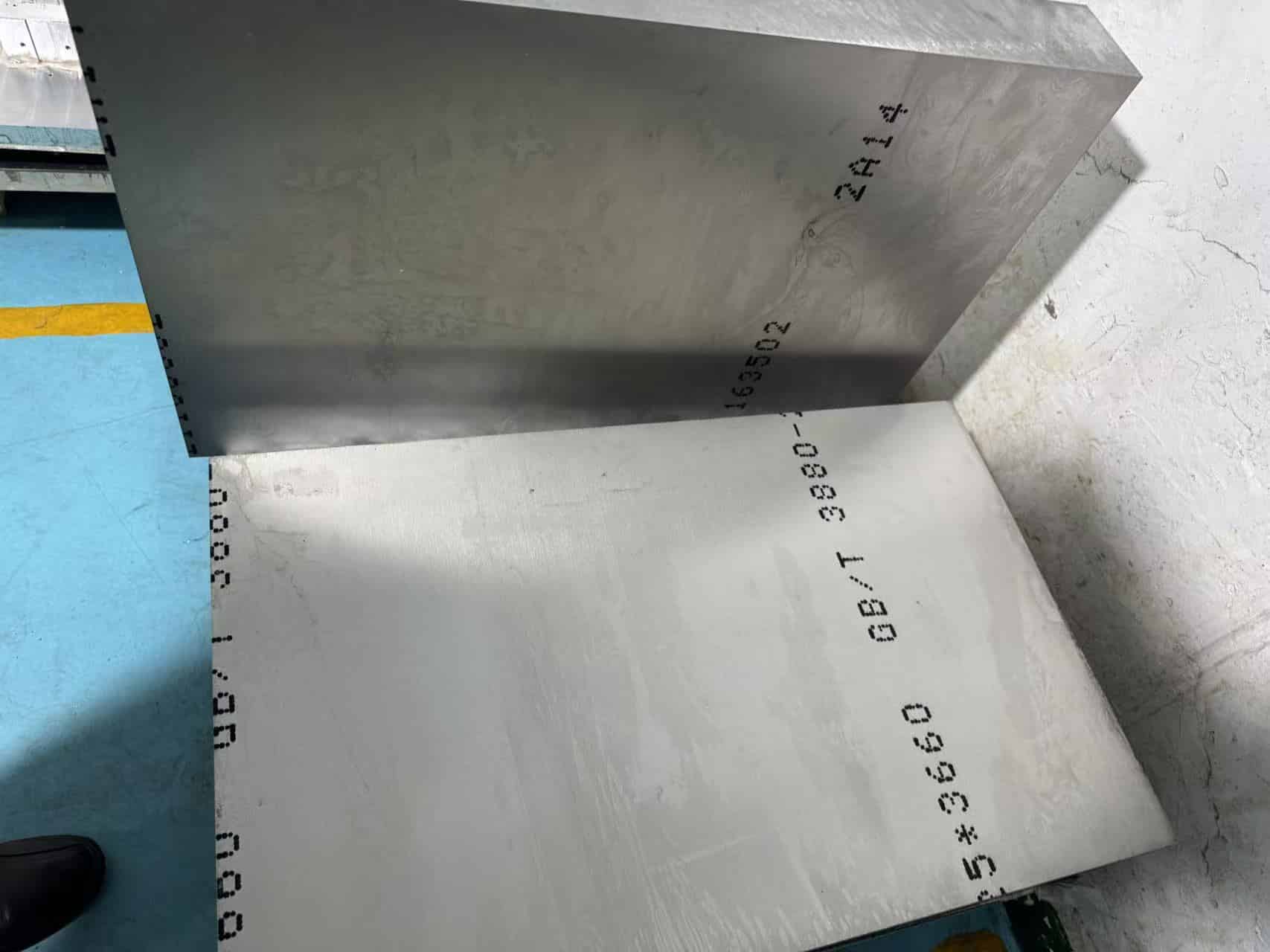 Large metal plates with printed specifications